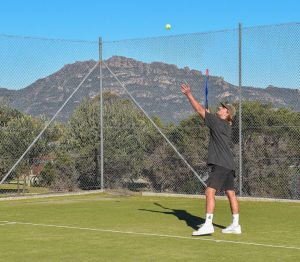 Playing tennis at Edge of the Bay Resort