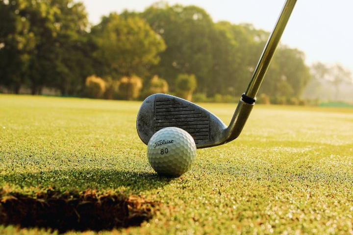 Winning putt on golf course green