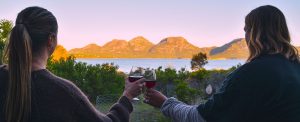 Couple drinking wine at Edge of the Bay