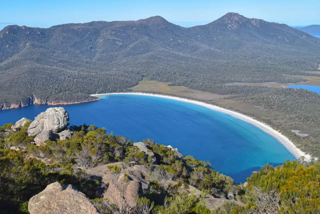 Wineglass Bay 💙 It’s been dubbed the world’s best beach so many times, but the popularity hasn’t gone to its head. The curvy white sands and brilliant blue waters are still unaffected by all the attention. Seeing the iconic beach is reason enough to visit our region, but there’s more natural beauty around every corner on Tasmania’s spectacular East Coast 🤩📸 @dustandsaltstudio_#EdgeoftheBayFreycinet #FreycinetPeninsula #IntrepidTravel #discovertasmania #wineglassbay #EastCoastTasmania