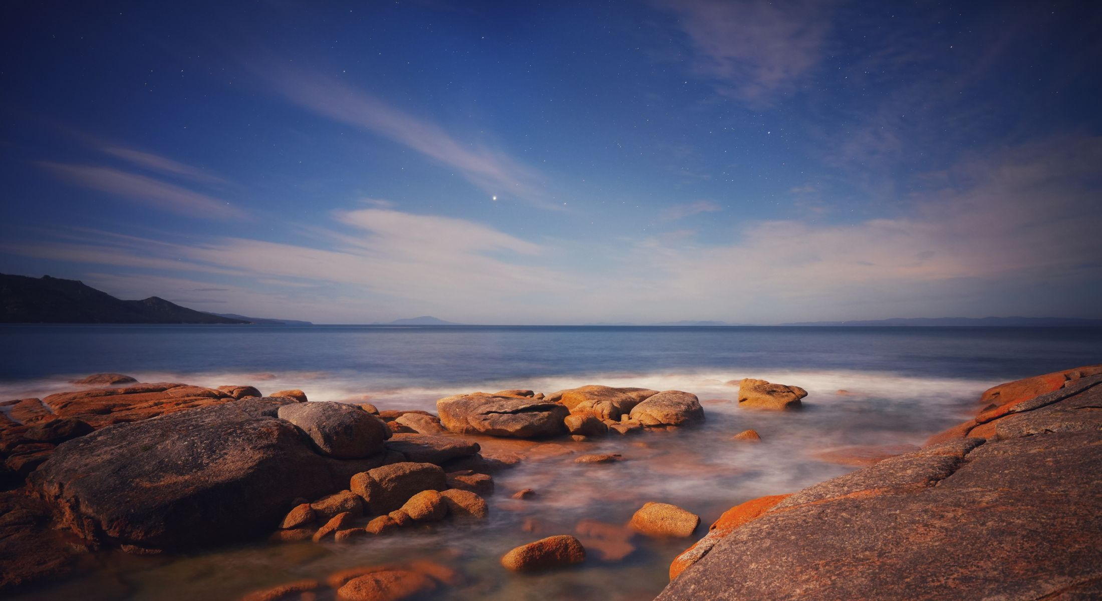 Coloured rocks and ocean view from Edge of the Bay